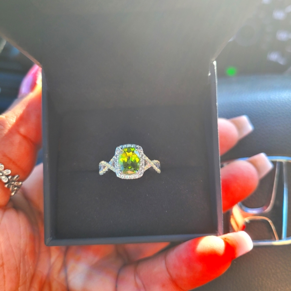 White gold peridot and diamond ring